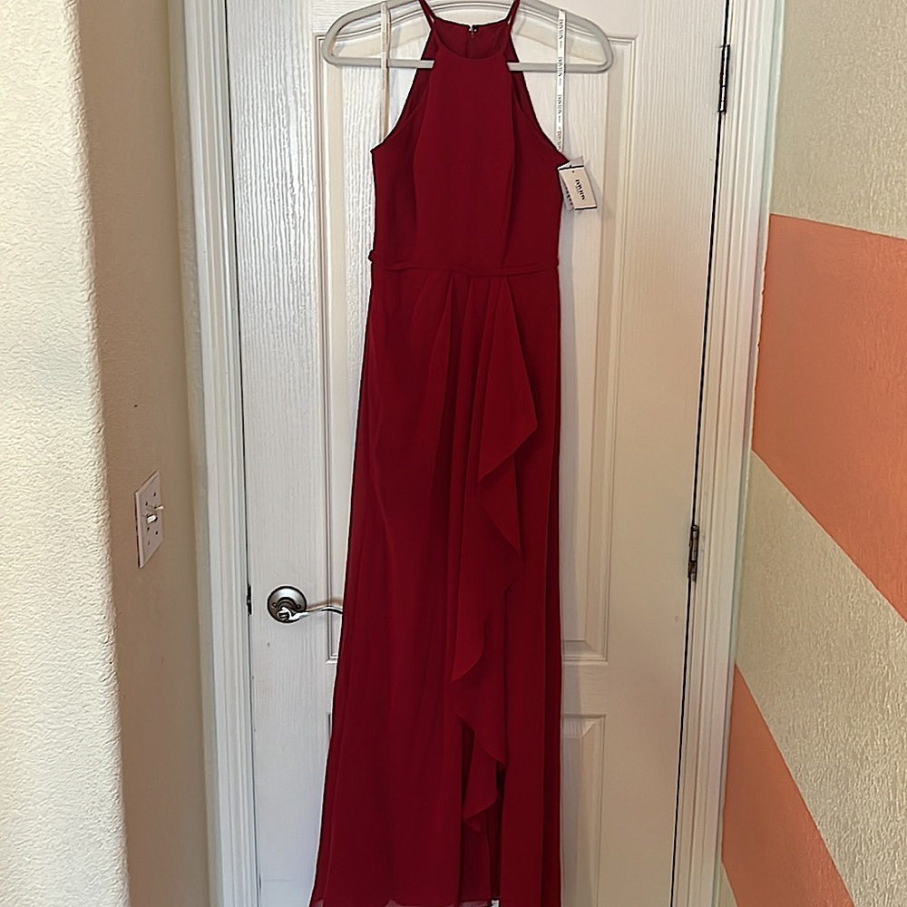 Red Maxi dress with halter neck and slit.